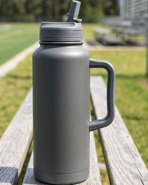 Wyvex Handled Vacuum-Insulated Sports Water Jug 40 oz Graphite Straw-Spout Lid - Lifestyle view